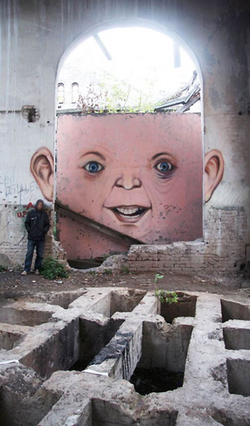 Caras en edificios por Nikita Nomerz