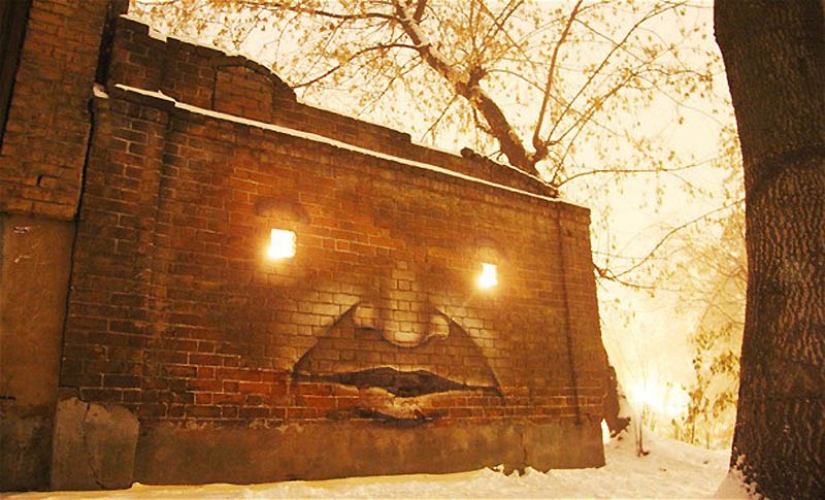 Caras en edificios por Nikita Nomerz
