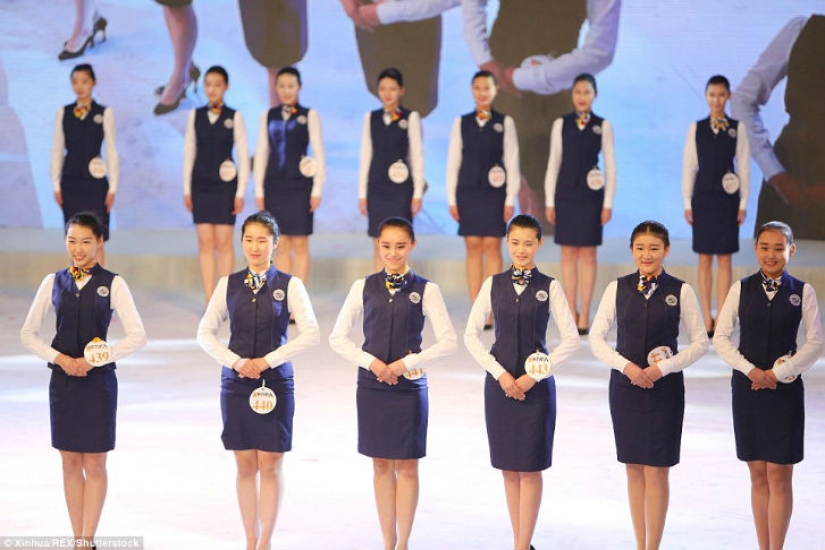 Chinese schoolgirls pose in bikinis hoping to become a flight attendant or model