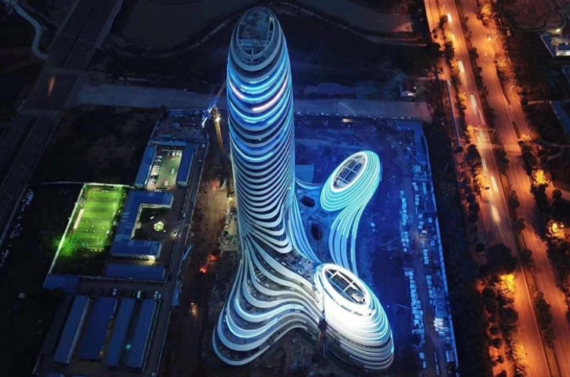 Chinese skyscraper in the form of a penis "ejaculated" into the sky with fireworks