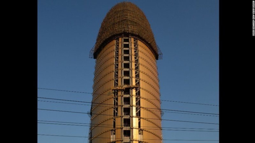 Chinese skyscraper in the form of a penis "ejaculated" into the sky with fireworks Chinese skyscraper in the form of a penis "ejaculated" into the sky with fireworks