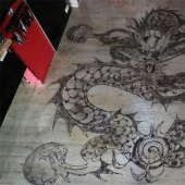 Cómo un peluquero chino convierte el cabello cortado en obras de arte