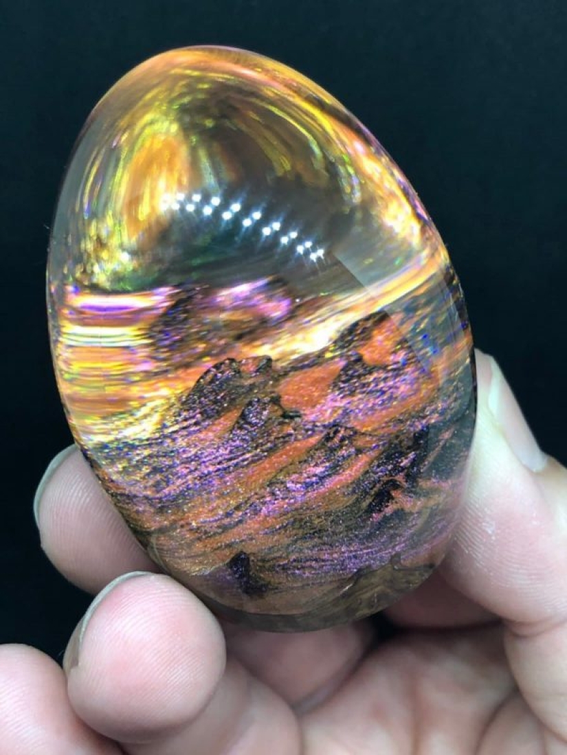 Colorful dragon eggs made of resin and wood by Australian artist Ben Works