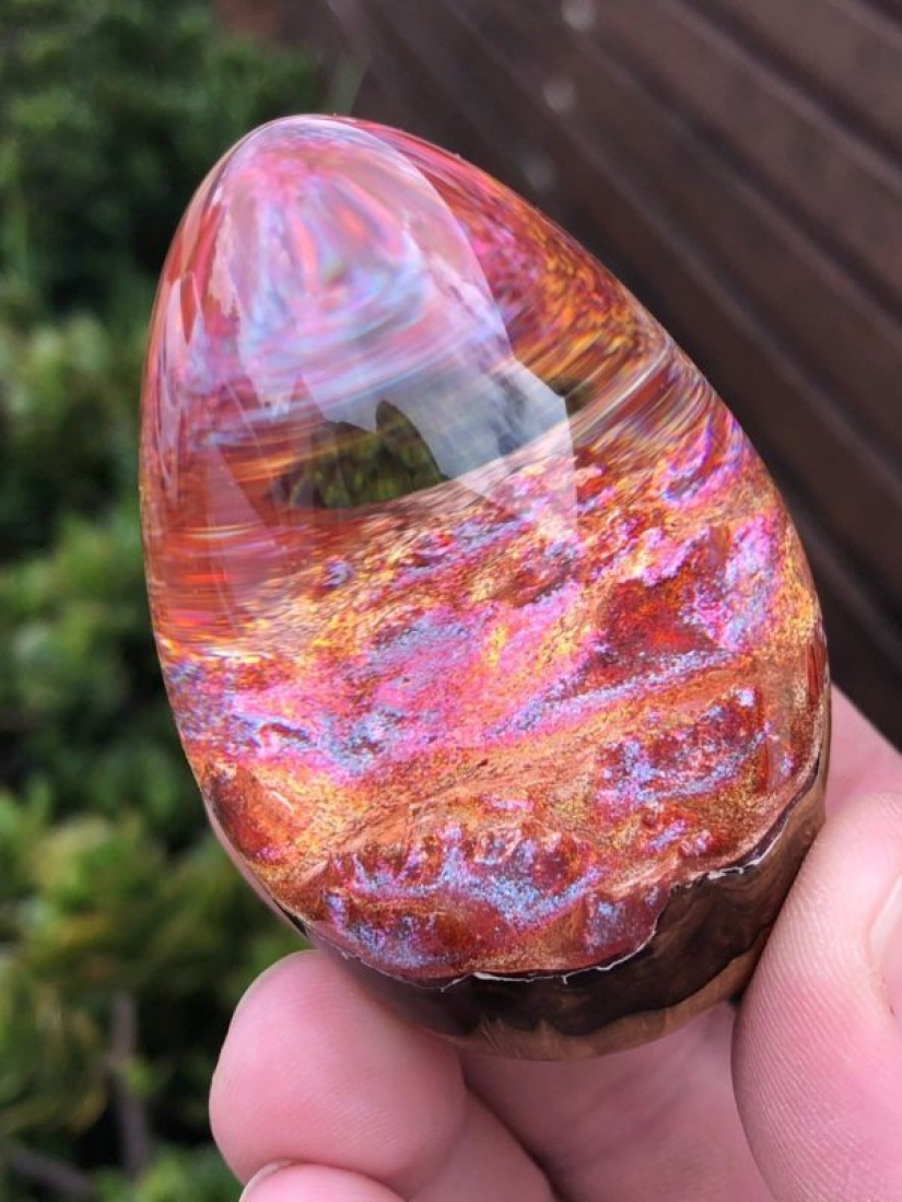 Colorful dragon eggs made of resin and wood by Australian artist Ben Works