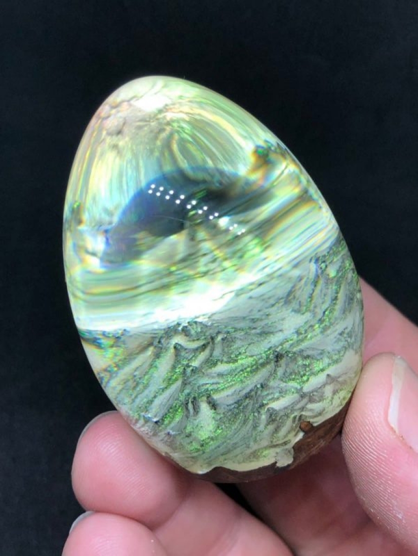 Colorful dragon eggs made of resin and wood by Australian artist Ben Works