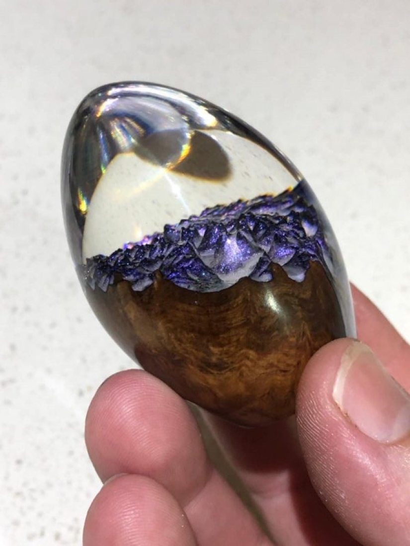 Colorful dragon eggs made of resin and wood by Australian artist Ben Works