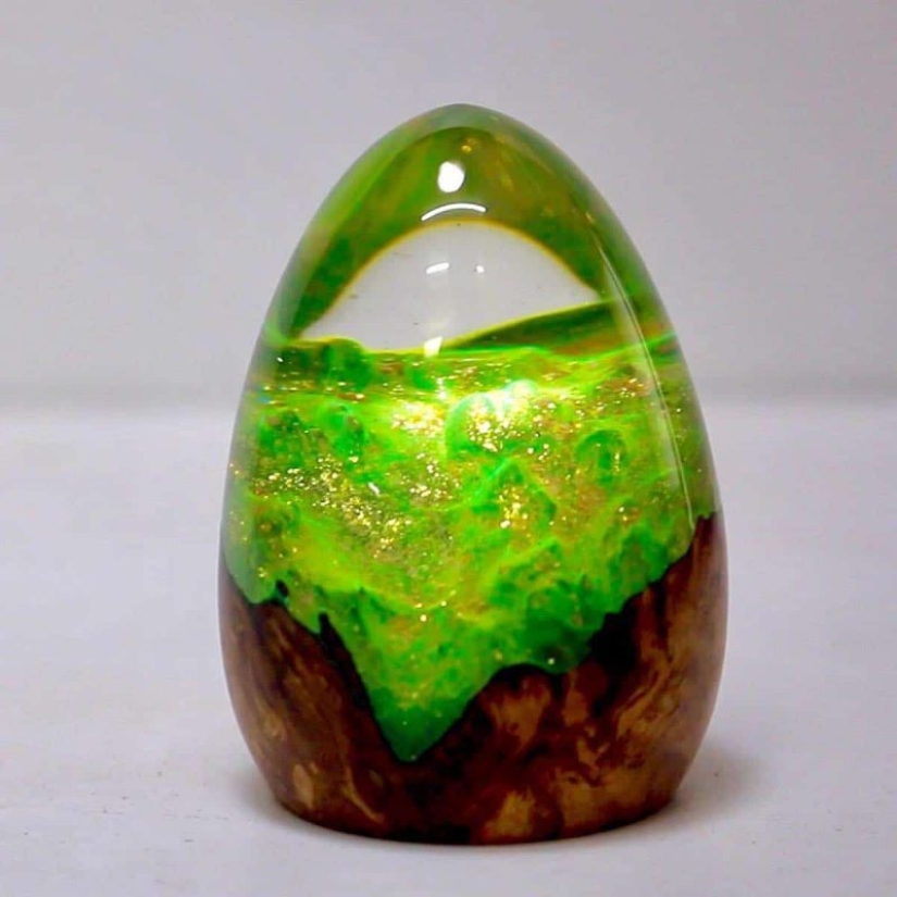 Colorful dragon eggs made of resin and wood by Australian artist Ben Works