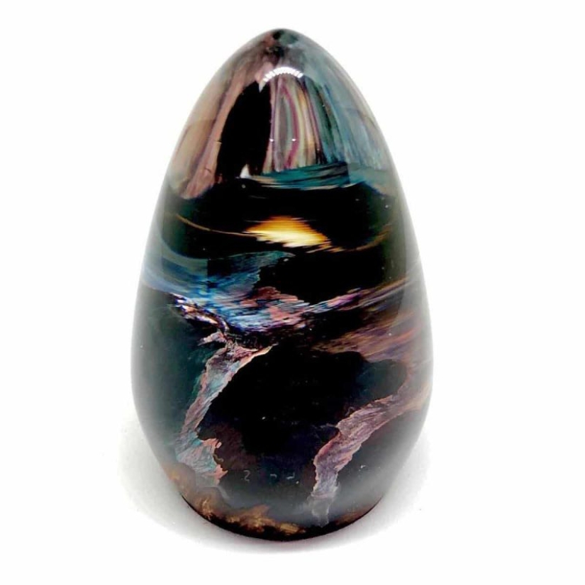 Colorful dragon eggs made of resin and wood by Australian artist Ben Works