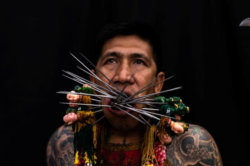 Extreme piercings put devotees in soul-cleansing trance at Thai festival Extreme piercings put devotees in soul-cleansing trance at Thai festival
