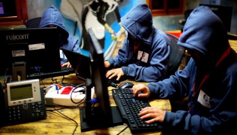 How are the "troll factories" organized and how much are their employees paid How are the "troll factories" organized and how much are their employees paid