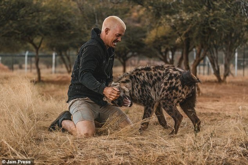 Hugging the Lions: Dean Schneider, the Swiss financier who gave up everything and went to Africa Hugging the Lions: Dean Schneider, the Swiss financier who gave up everything and went to Africa