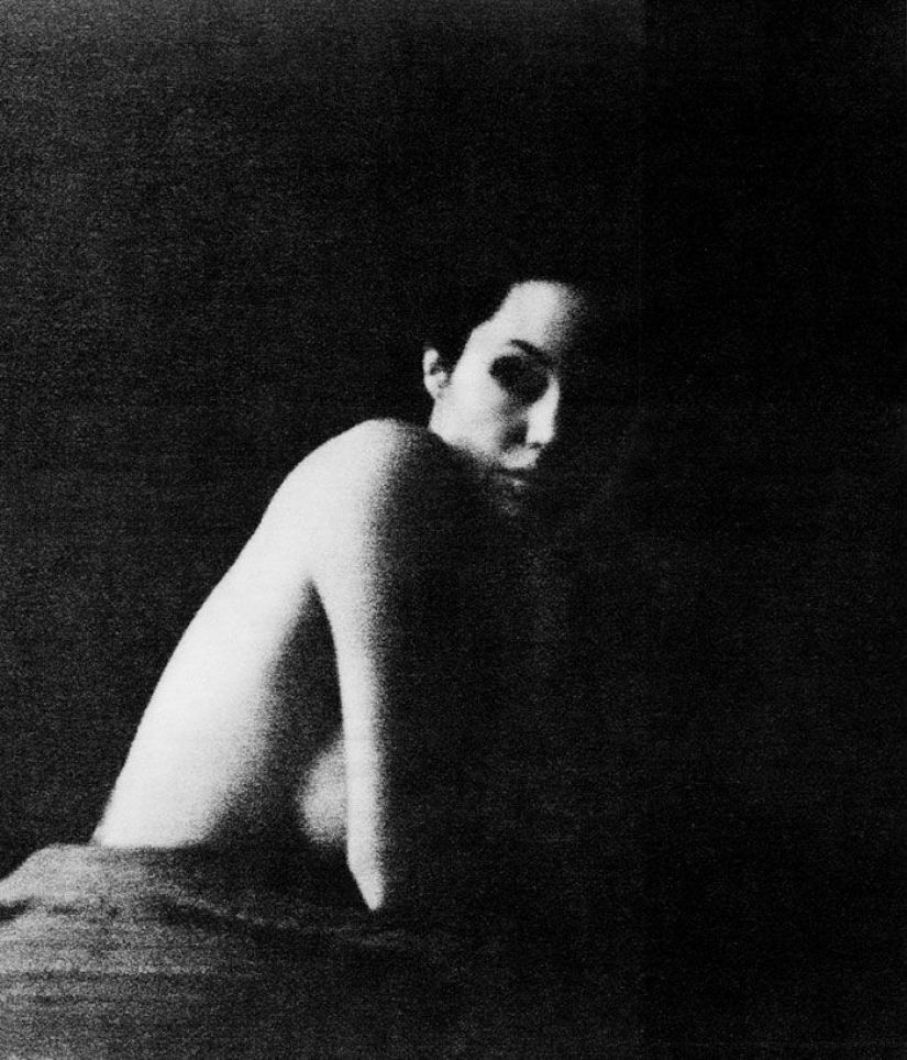 Intimate photos of Angelina Jolie taken by her husband Brad Pitt