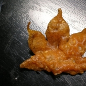 Leaves of maple in a deep fryer