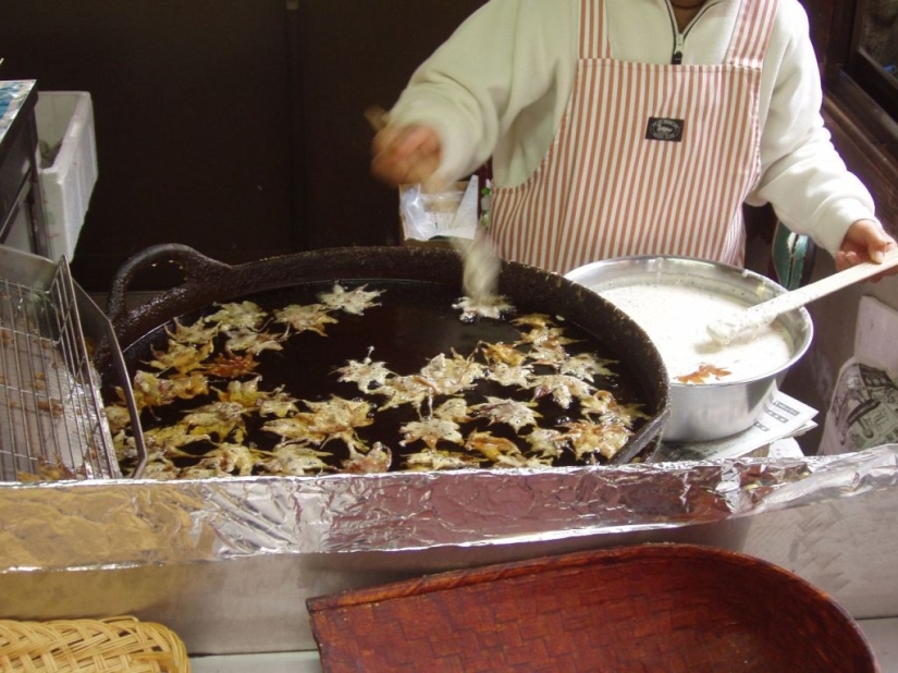 Leaves of maple in a deep fryer
