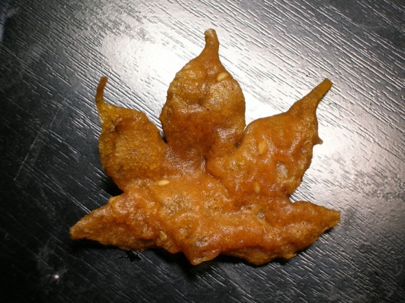 Leaves of maple in a deep fryer