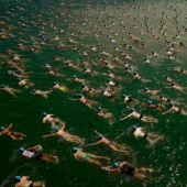 Mass swim blue caps in Lake Zurich