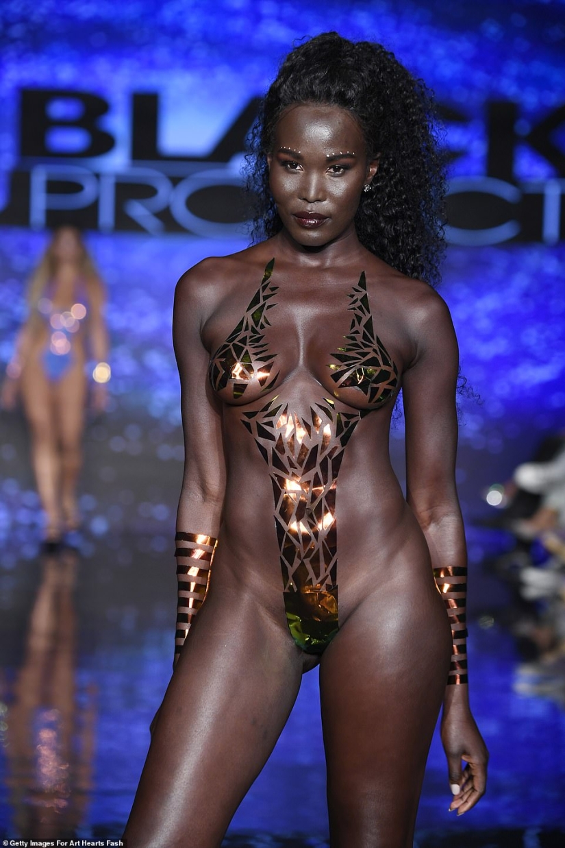 Miami Swim Week runway models pose in a ribbon bikini