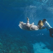 Stunning underwater engagement photo session