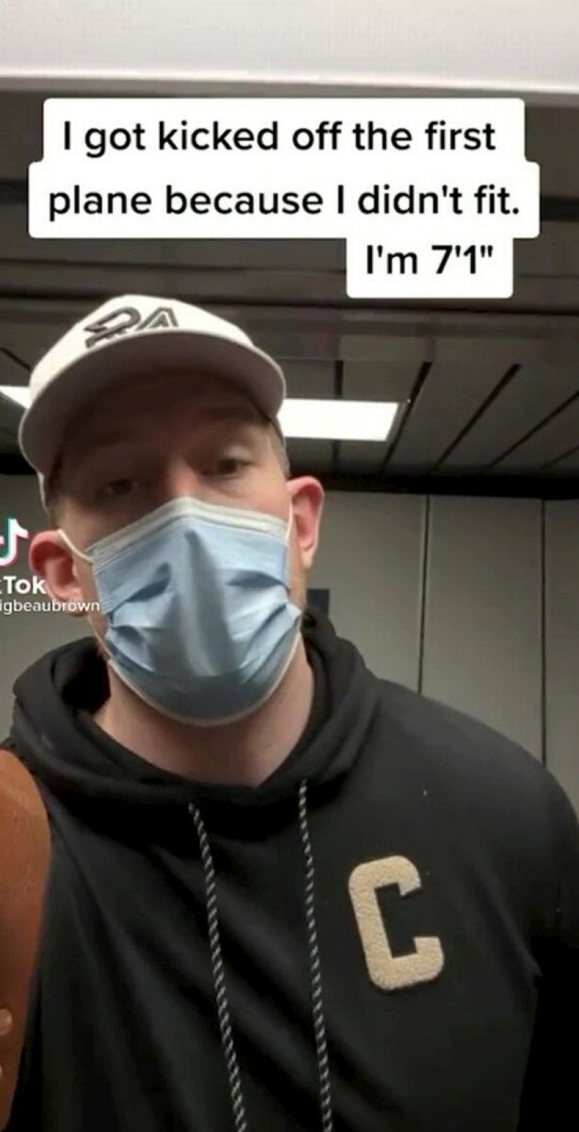 The "Giant" was transferred to first class because he did not fit into a standard seat on the plane The "Giant" was transferred to first class because he did not fit into a standard seat on the plane