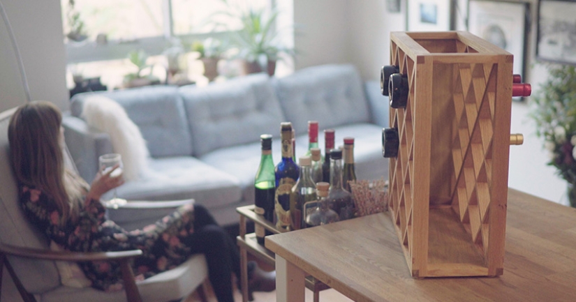 The illusionist created a wine rack in which bottles disappear The illusionist created a wine rack in which bottles disappear