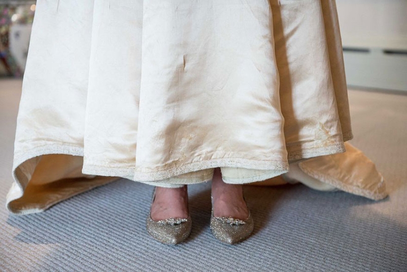 This bride is the 11th in her family to wear this 120—year-old wedding dress