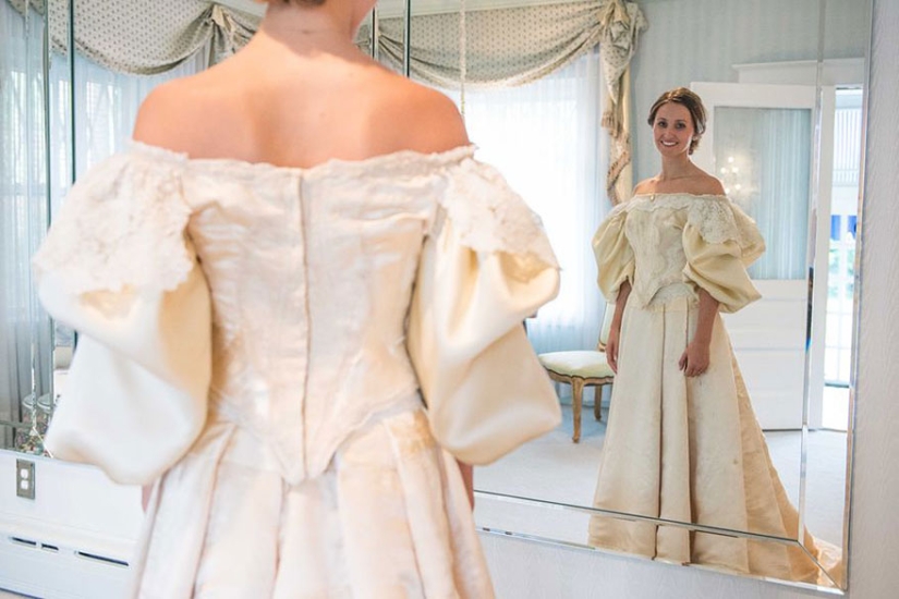 This bride is the 11th in her family to wear this 120—year-old wedding dress