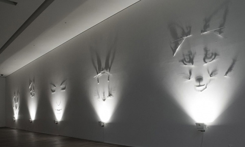 Un artista que pinta con una sombra Un artista que pinta con una sombra