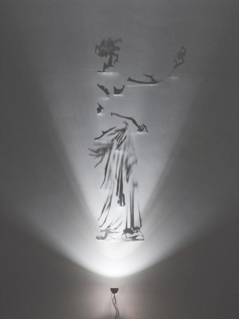 Un artista que pinta con una sombra Un artista que pinta con una sombra