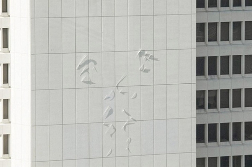 Un artista que pinta con una sombra Un artista que pinta con una sombra