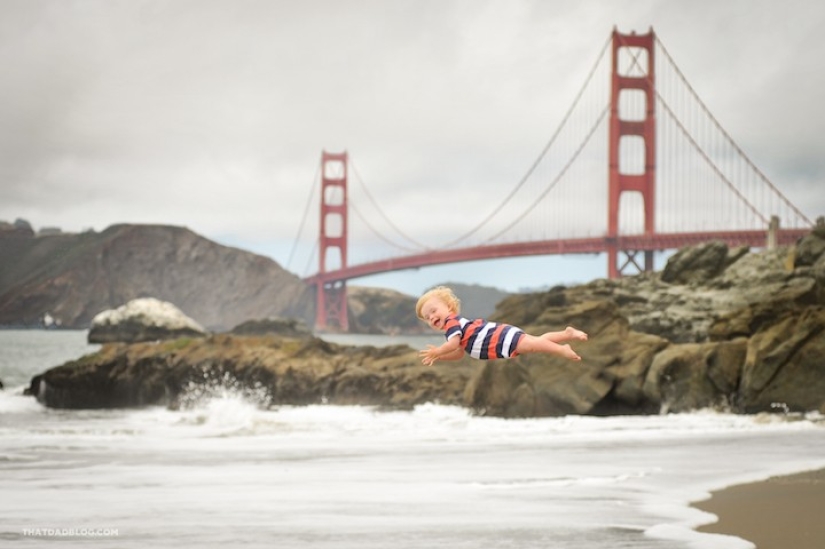 Un padre amoroso ayuda a su hijo" soleado " a volar