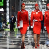 What does the uniform of flight attendants look like in different airlines