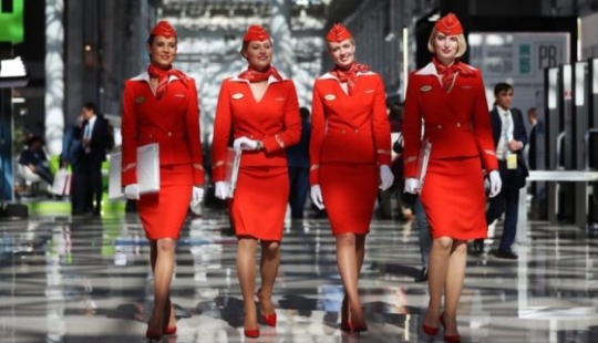 What does the uniform of flight attendants look like in different airlines
