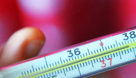 Why do some people put a thermometer under their arm, others in their mouths, and some...