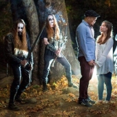 A metal band accidentally participated in an engagement photo shoot of a couple in love