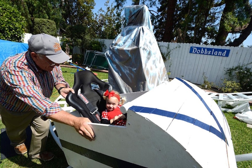 An engineer grandfather built an amusement park in the backyard for his grandchildren