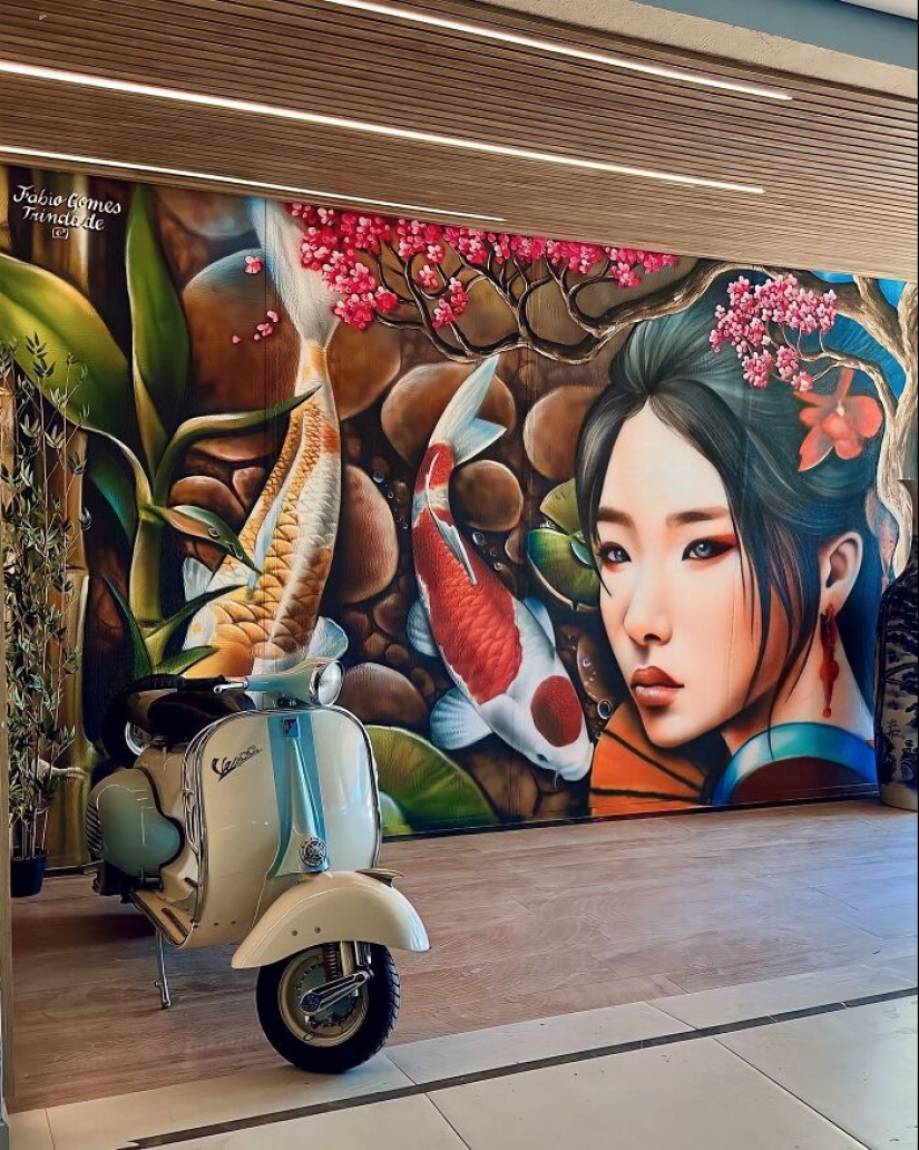 Artista callejero continúa pintando retratos en paredes junto a árboles que también sirven como cabello Artista callejero continúa pintando retratos en paredes junto a árboles que también sirven como cabello