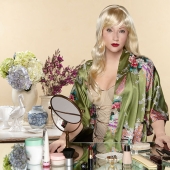 Black and white photo: a mulatto woman takes pictures of herself in the image of her white ancestors