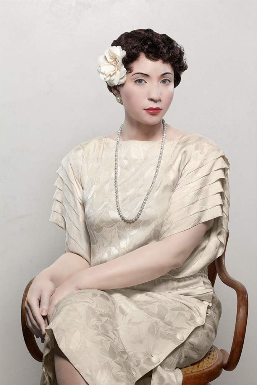 Black and white photo: a mulatto woman takes pictures of herself in the image of her white ancestors Black and white photo: a mulatto woman takes pictures of herself in the image of her white ancestors