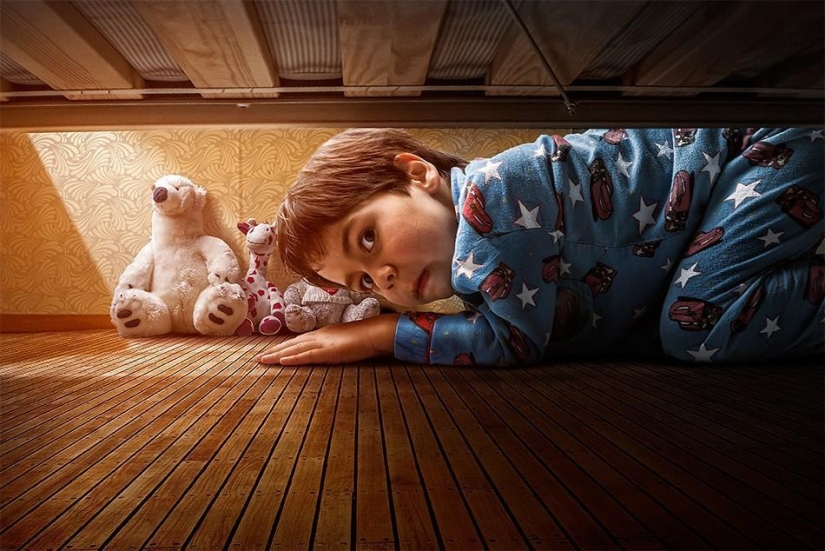 Childhood in the frame: dad takes a picture of his son