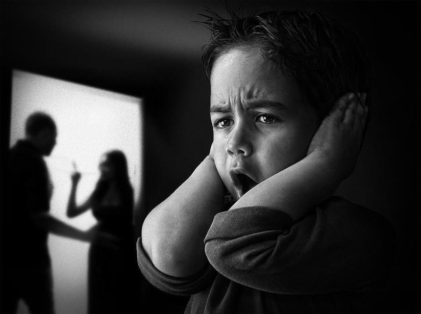 Childhood in the frame: dad takes a picture of his son