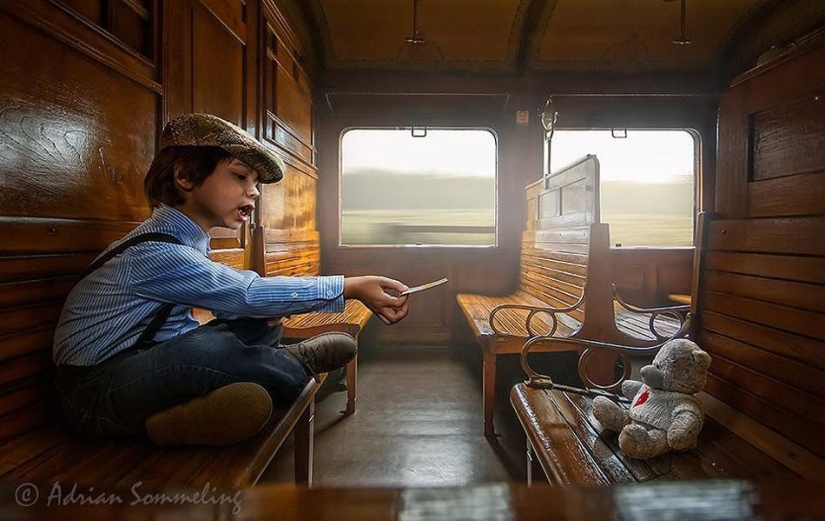 Childhood in the frame: dad takes a picture of his son