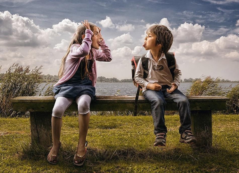 Childhood in the frame: dad takes a picture of his son