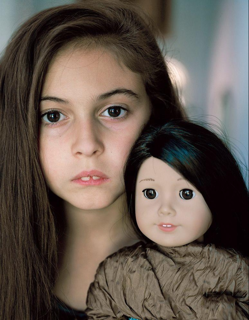 Children&#39;s fashion: girls and their dolls