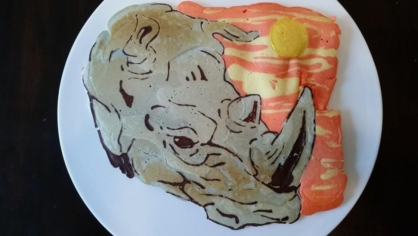 Creative dad bakes fantastic colorful pancakes for his child