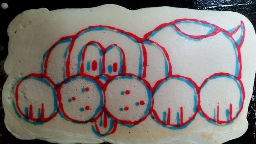 Creative dad bakes fantastic colorful pancakes for his child