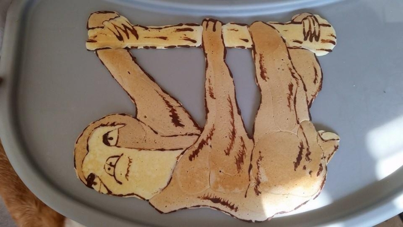 Creative dad bakes fantastic colorful pancakes for his child