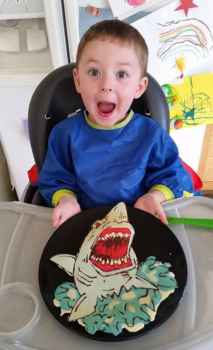 Creative dad bakes fantastic colorful pancakes for his child