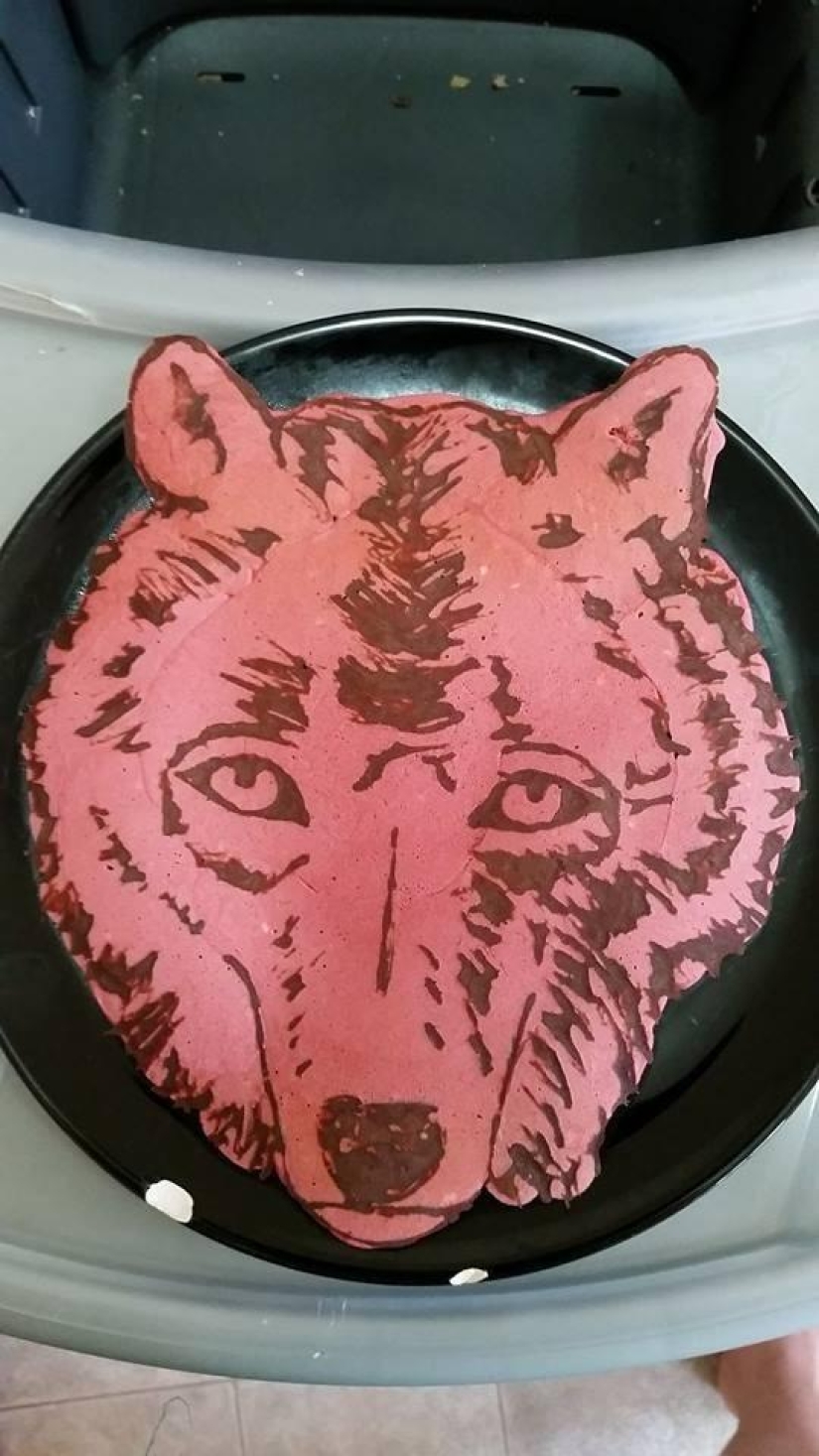Creative dad bakes fantastic colorful pancakes for his child
