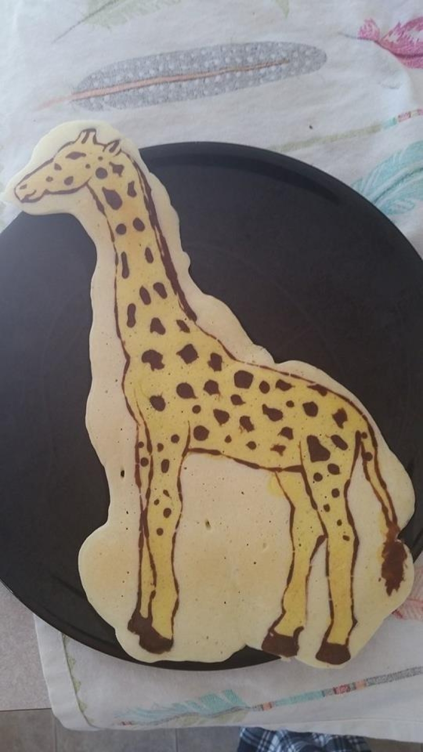 Creative dad bakes fantastic colorful pancakes for his child