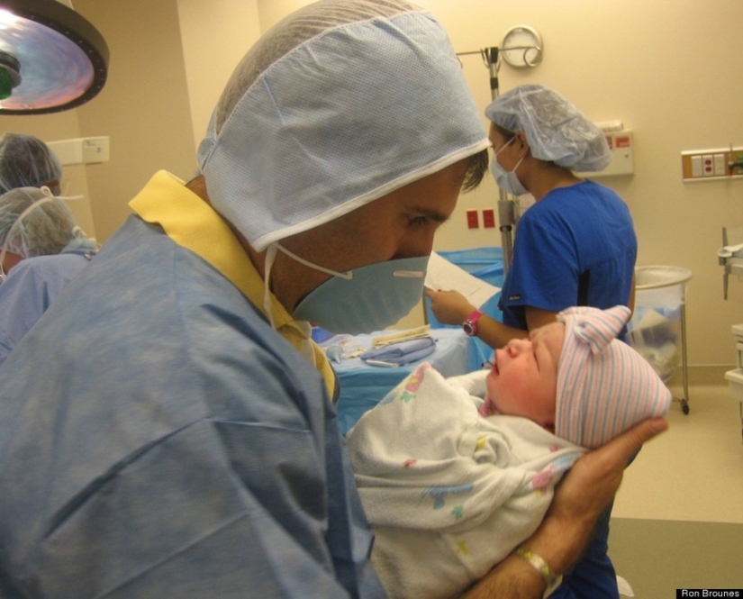 Dads see their newborn babies for the first time Dads see their newborn babies for the first time